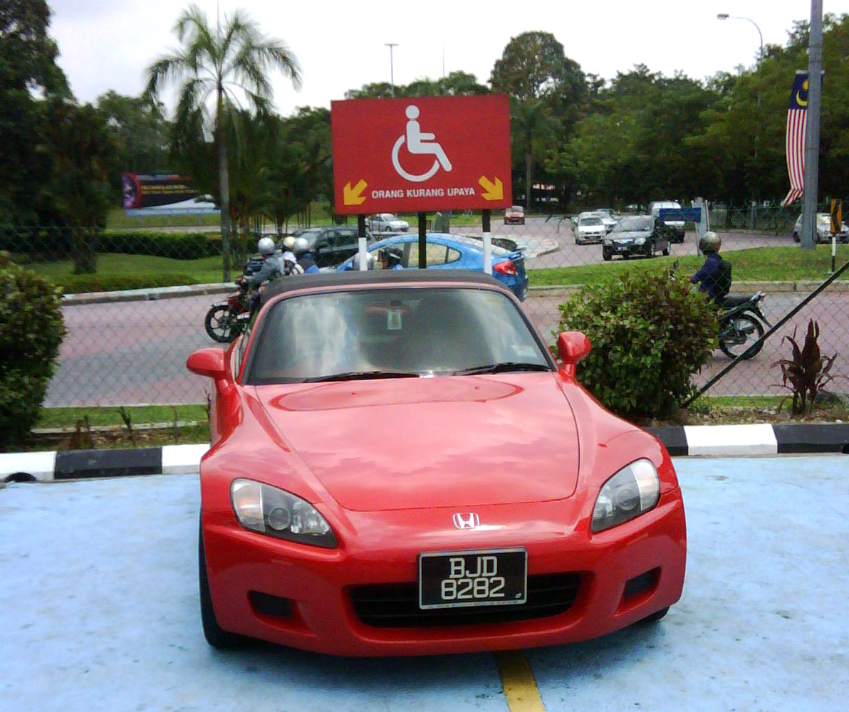 BJD 8282 parking in spaces reserved for disabled people