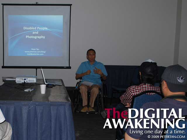Peter Tan giving a talk about Disabled People and Photography at DCIM Show 2009