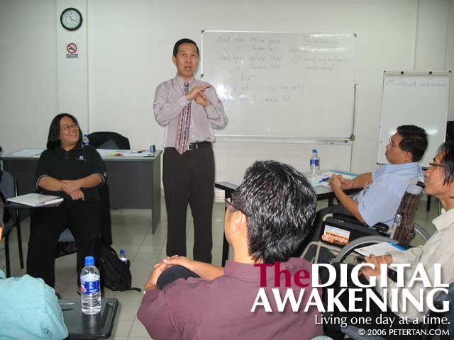 Mr. Simon Teo emphasizing a point during the training