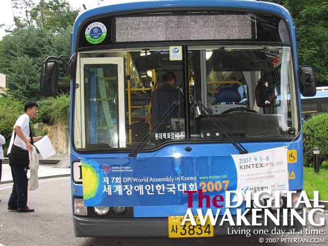 Non-step bus to ferry participants to the 7th DPI World Assembly from Grand Hilton Seoul to KINTEX