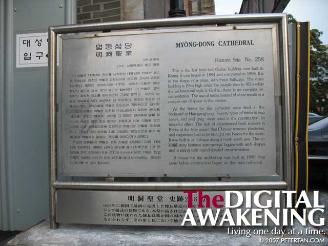Information board on the history of the Myong Dong Cathedral